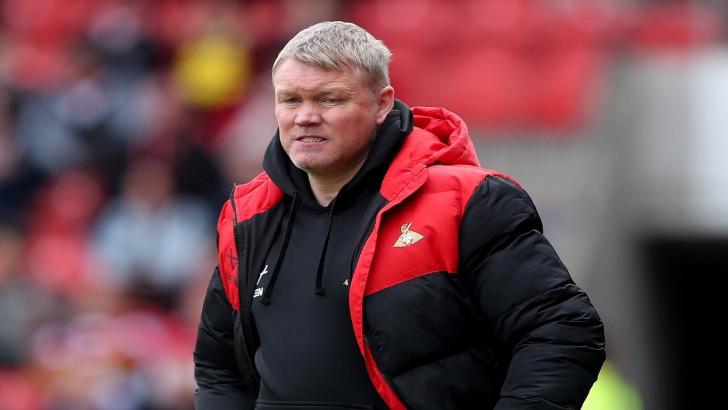 Doncaster Rovers boss Grant McCann watches on